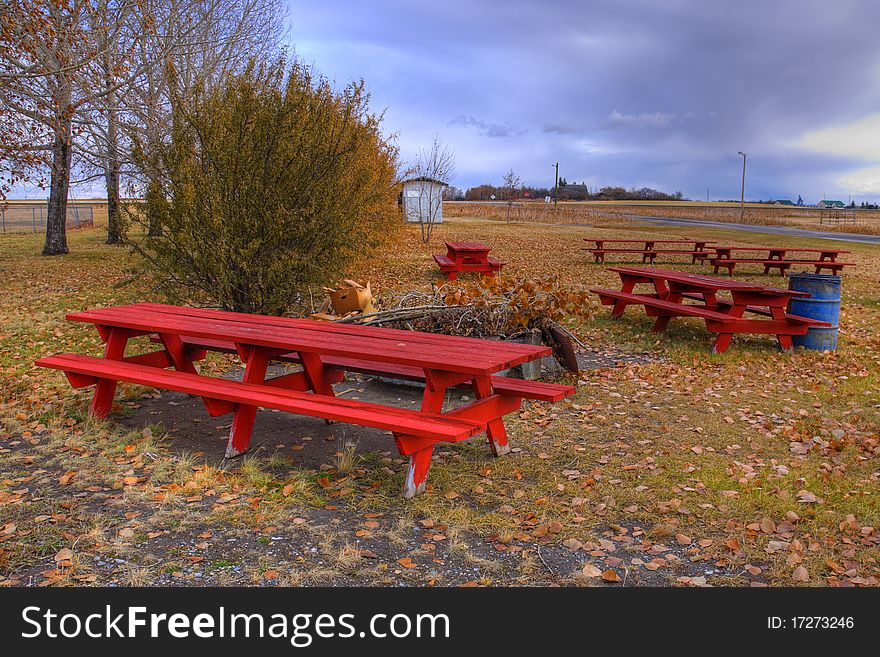 High dynamic range of some red picnic tables. High dynamic range of some red picnic tables