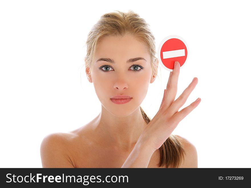 Beautiful woman with prohibiting sign isolated in white