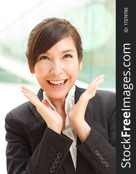 Portrait of young cheerful business woman. Portrait of young cheerful business woman