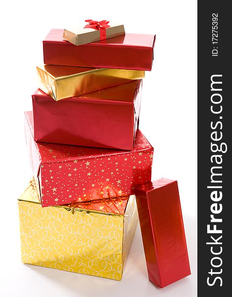 Red And Gold Gifts On White Background