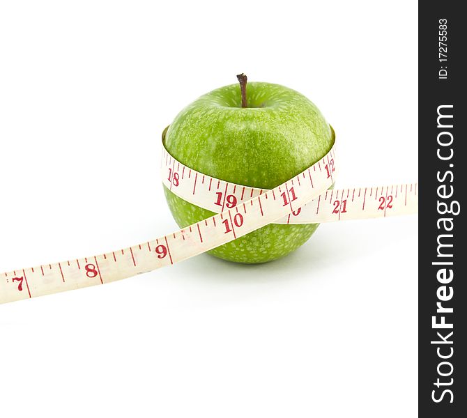 Green apple with tape on white background