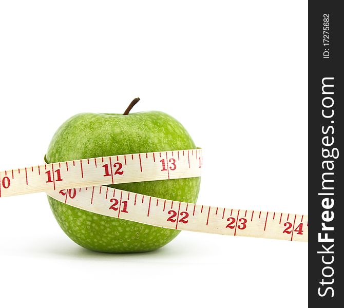 Green apple with tape on white background