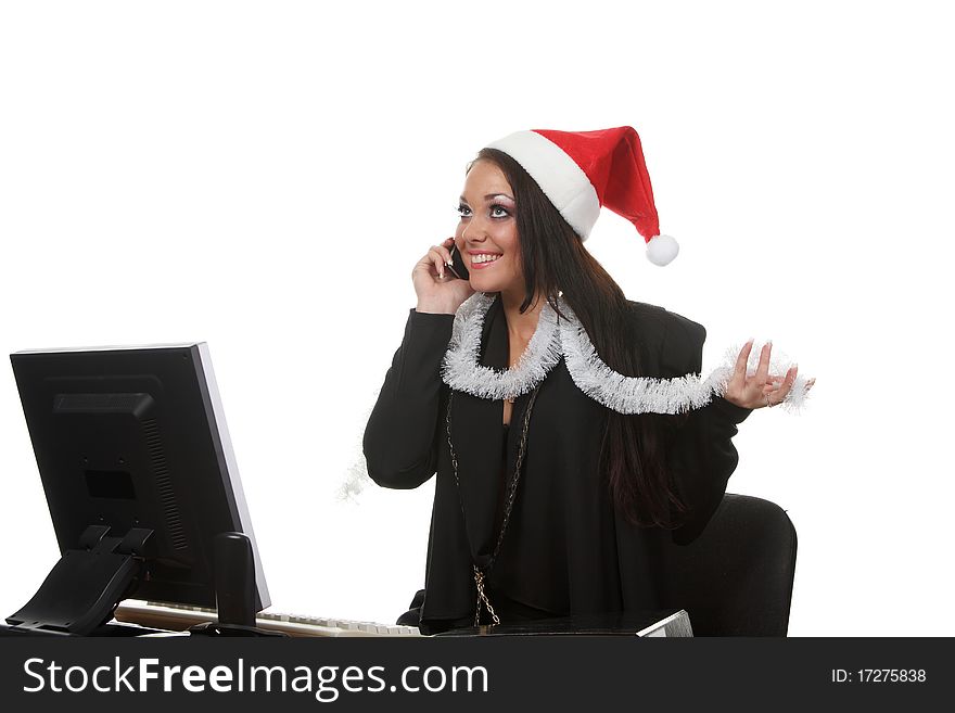 Young businesswoman in a christmas hat