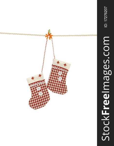 Christmas stockings hanging from a clothesline. Christmas stockings hanging from a clothesline