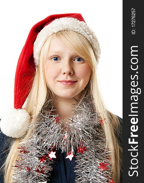 A beautiful young blonde in a Santa hat on a white background
