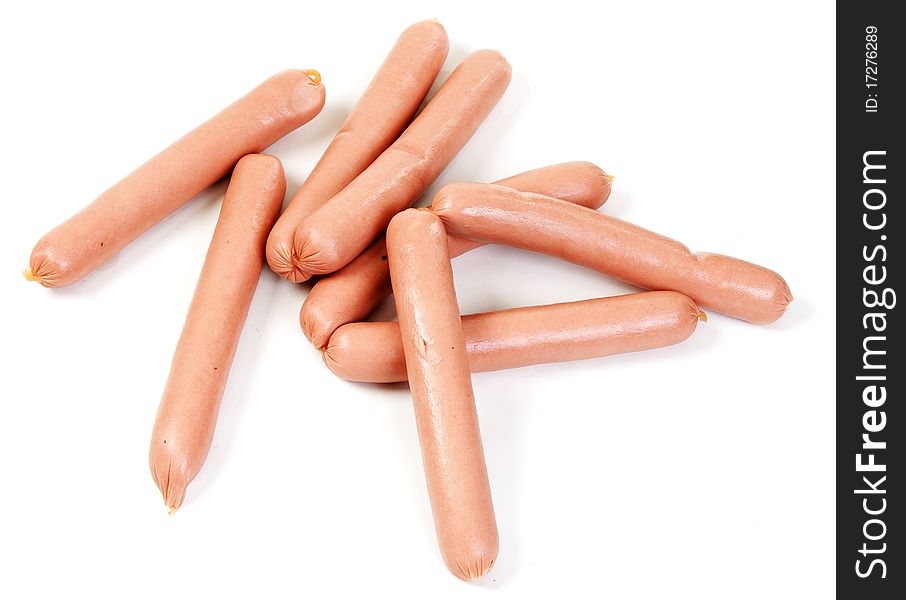 Pile of raw sausages on white background
