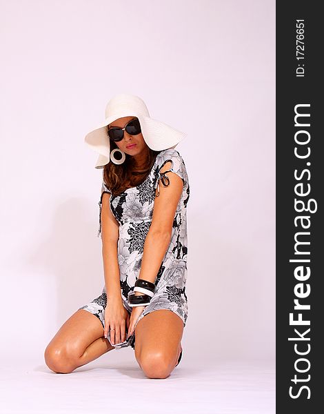 Summer girl wearing sunglasses and short dress