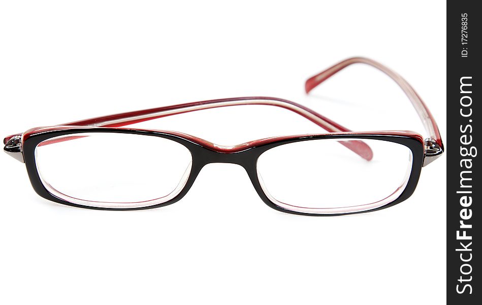 Stylish red glasses on a white background