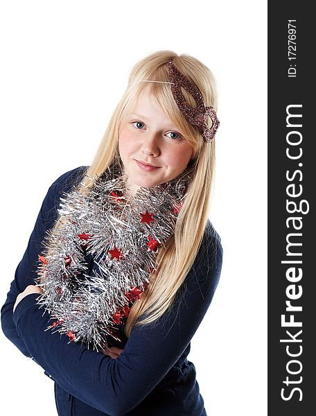A beautiful young girl in the Christmas tinsel on a white background