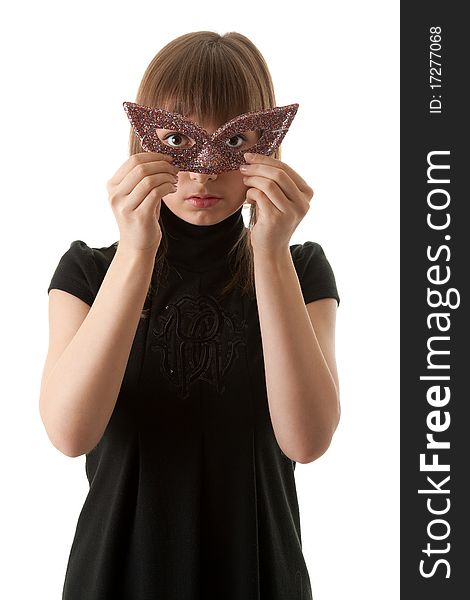 Beautiful girl in black dress and wearing a mask on a white background