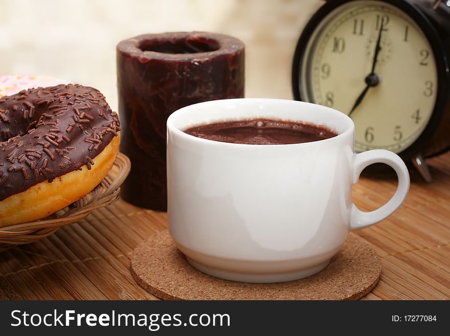 Hot chocolate with chocolate cake and candle. Hot chocolate with chocolate cake and candle.