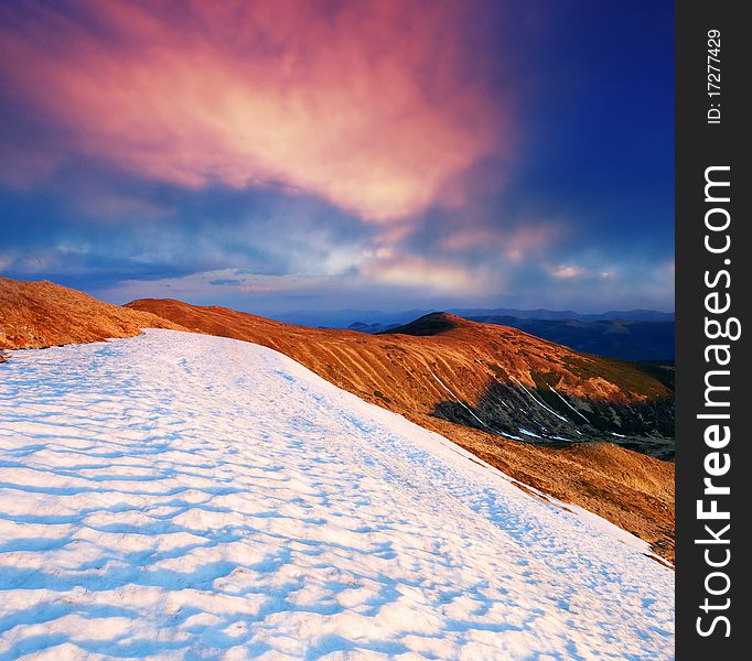 Spring in mountains and last snow. The Ukrainian mountains Carpathians