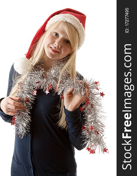 A beautiful young blonde in a Santa hat on a white background