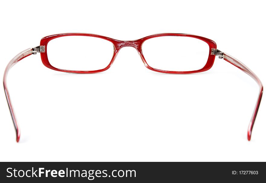 Stylish red glasses on a white background