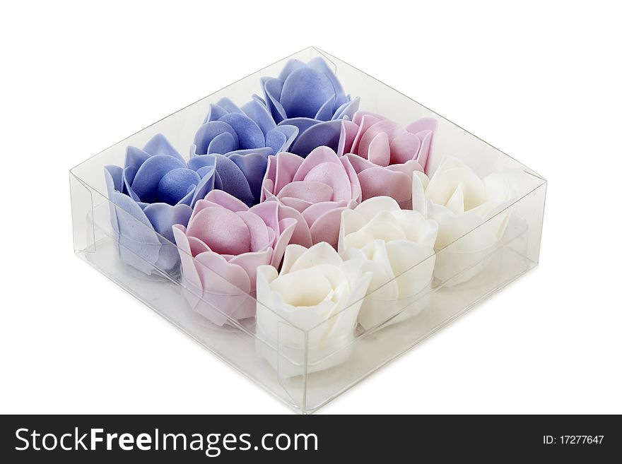 Soap in the shape of a flower in a transparent box