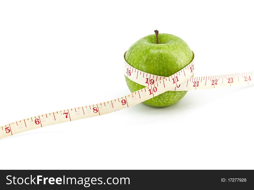 Green apple with tape on white background