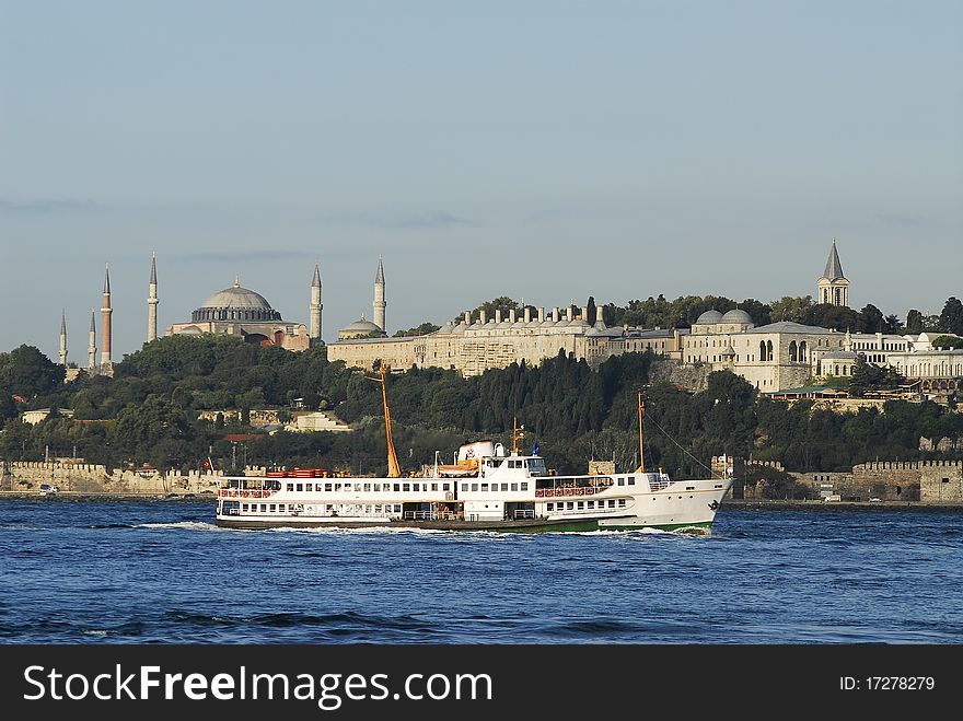 A ferry passing by near topkapi palace and hagia sophia museum