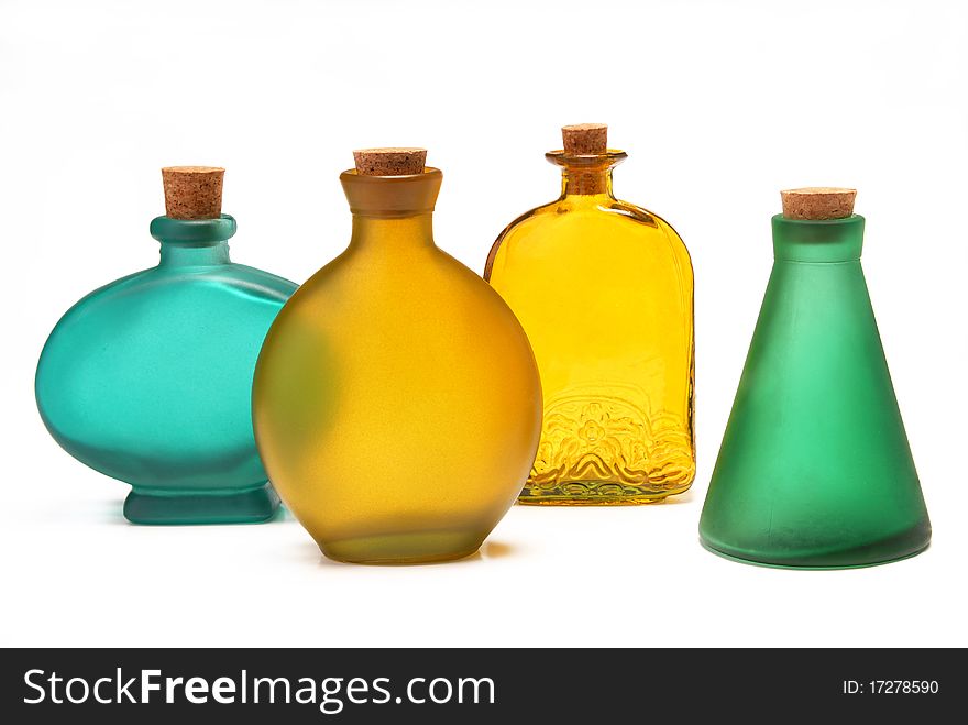 Many different bottles on a white background