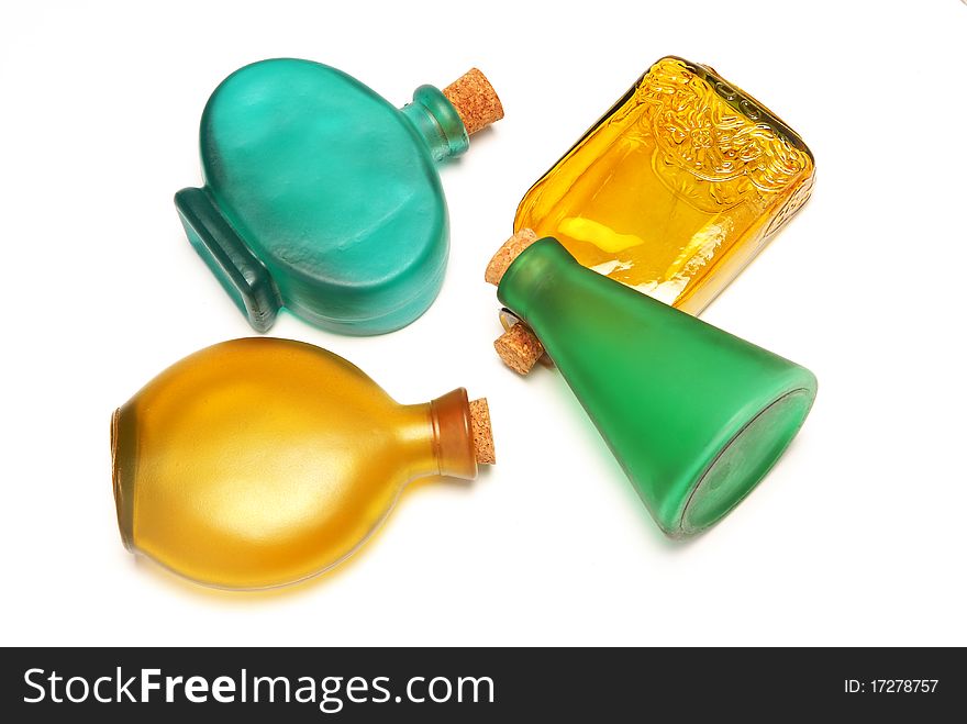 Many different bottles on a white background