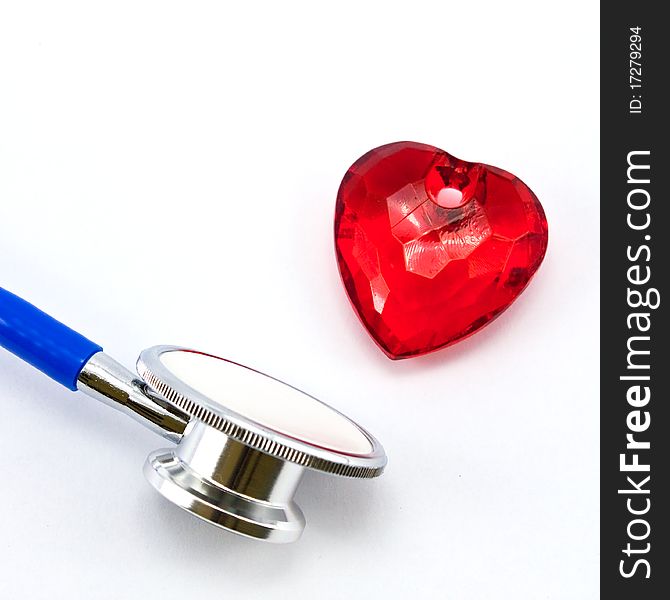 Heart and a stethoscope on a white background. Concept for cardiology.