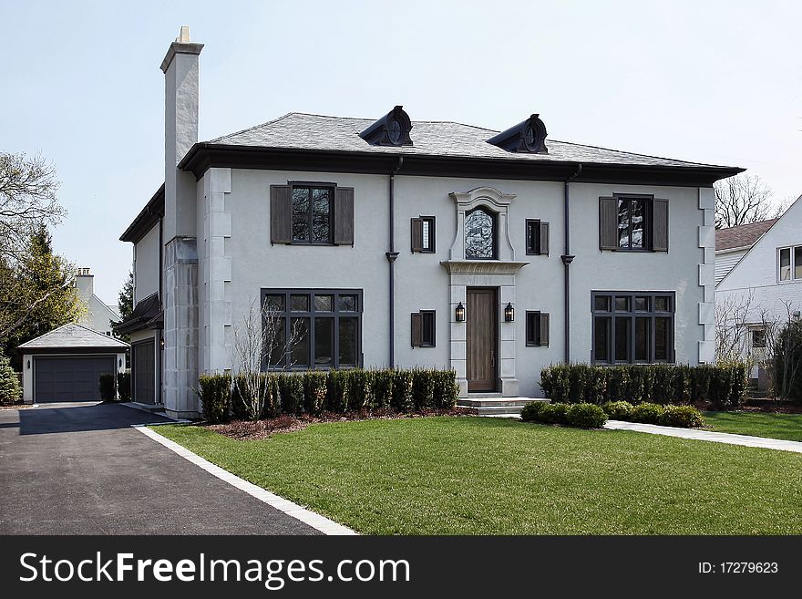 Luxury home with rounded windows on roof. Luxury home with rounded windows on roof