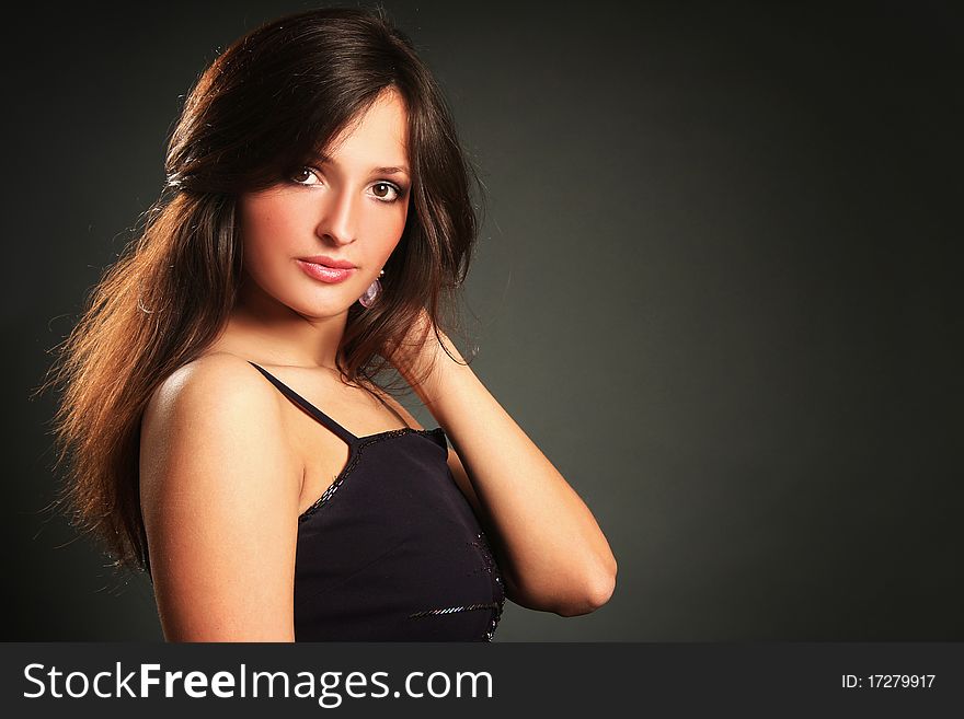 young woman on dark background. young woman on dark background