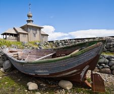 Wooden Chapel And Boat On Greater Zayatsky Island Royalty Free Stock Photo