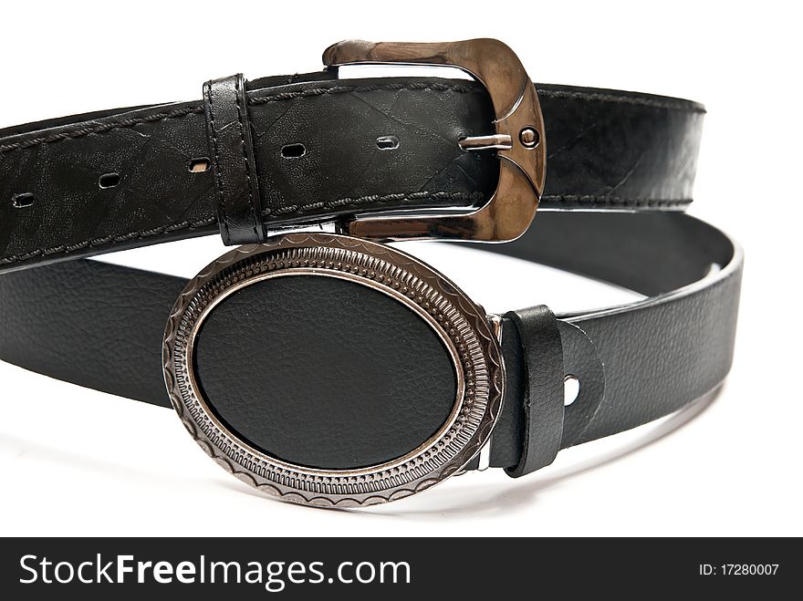 Two leather belts isolated on white background