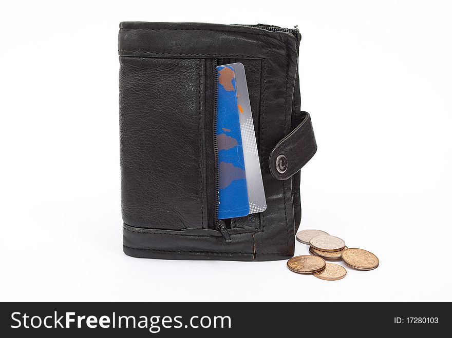 Coins and plastic cards in black wallet on white