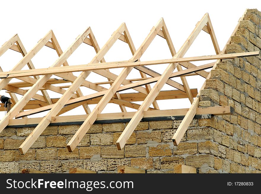 Building of brick house with the wooden roof. Building of brick house with the wooden roof