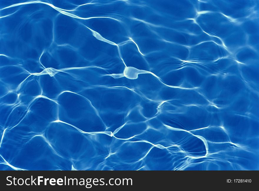 Blue pool texture with water ripples.