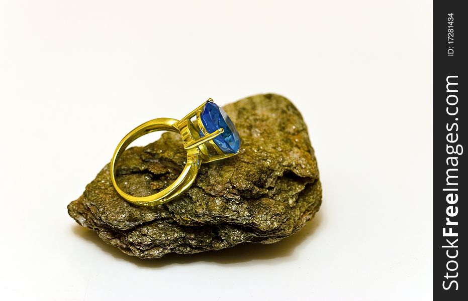 Gold ring with blue topaz gemstone. Gold ring with blue topaz gemstone