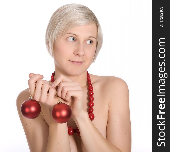 Naked girl in studio with christmas ornaments. Naked girl in studio with christmas ornaments