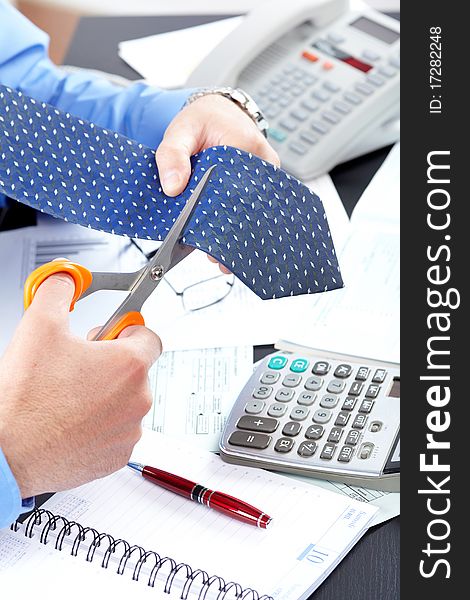 Businessman Cutting The Tie