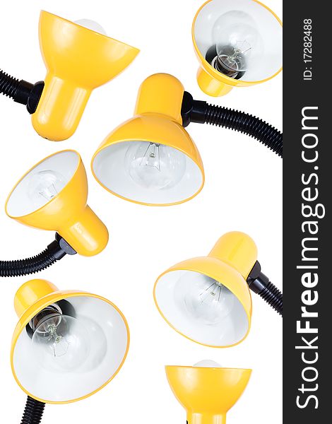 A lot of fun yellow table lamps on a white background. A lot of fun yellow table lamps on a white background