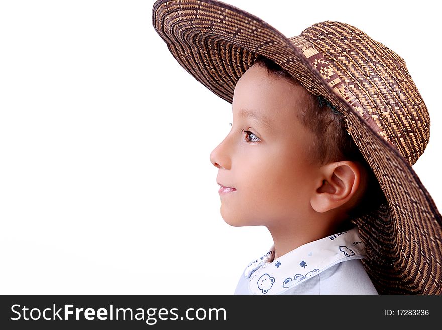 Four years old child looking with hat on white background