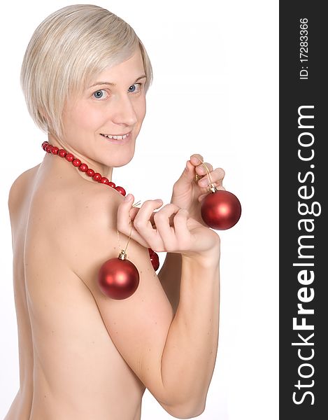 Naked girl in studio with christmas ornaments. Naked girl in studio with christmas ornaments