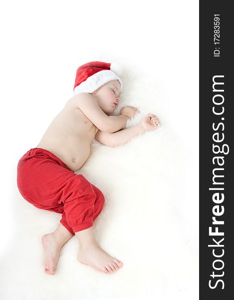 Baby in christmas suit is sleeping