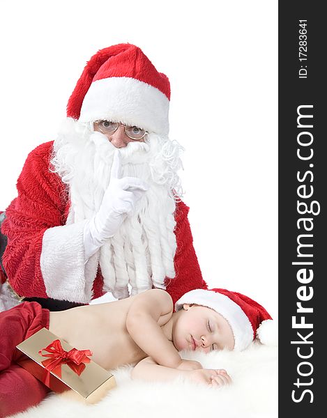 Baby in christmas suit is sleeping