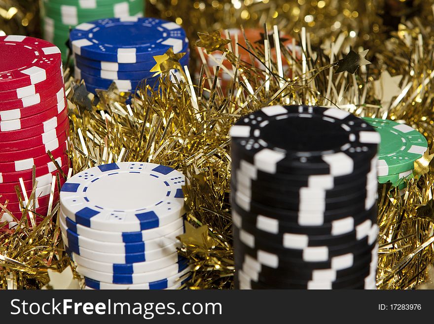 Casino chips bonus in a worm Christmas light and background