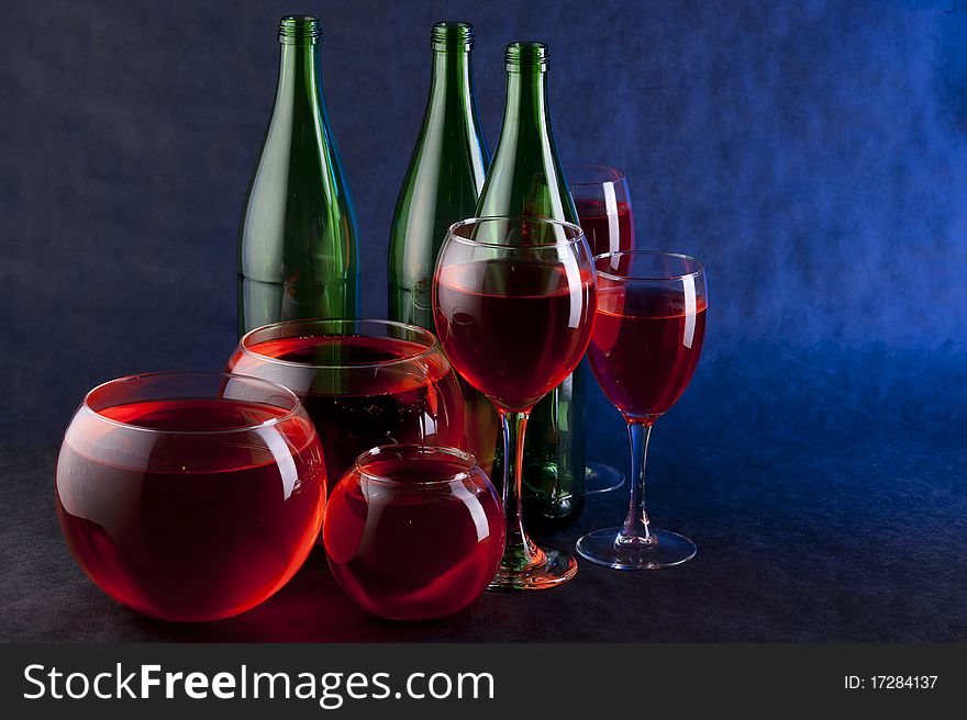 Red wine on the black background