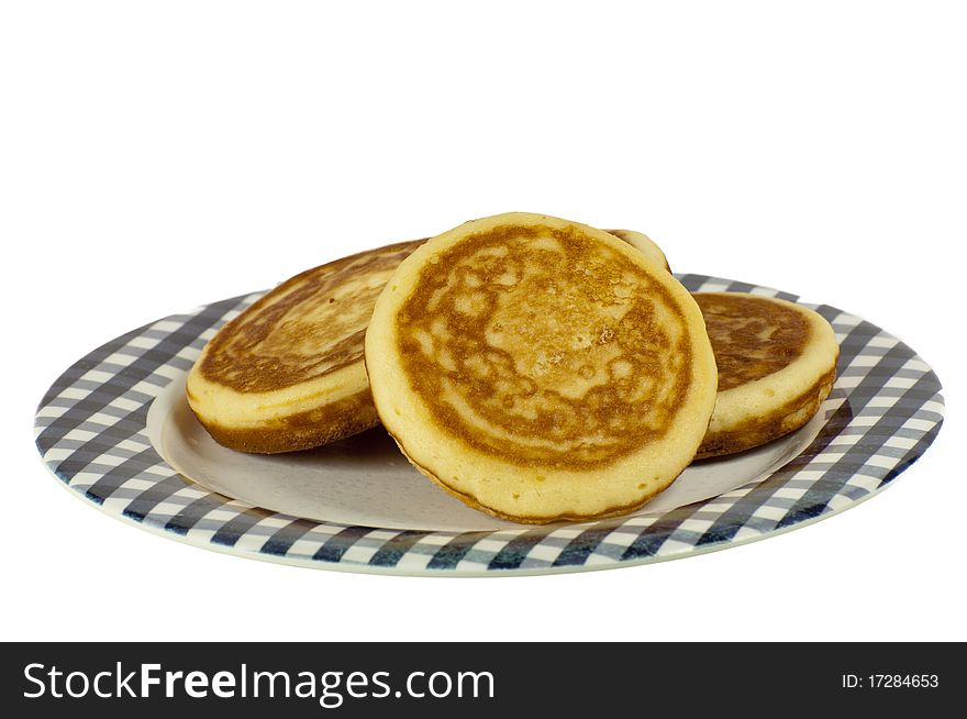 Stack of pancakes isolated on a white background