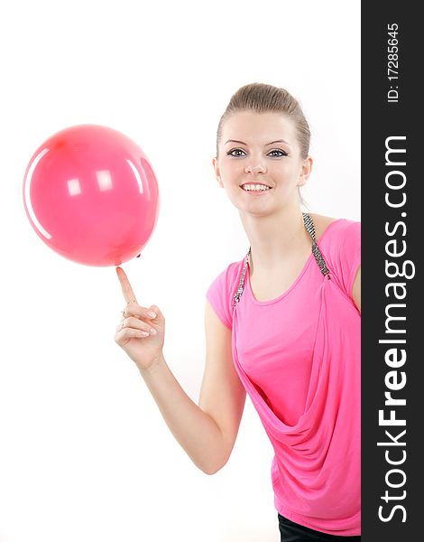 Studio portrait of young happy girl with red balloon over white. Studio portrait of young happy girl with red balloon over white