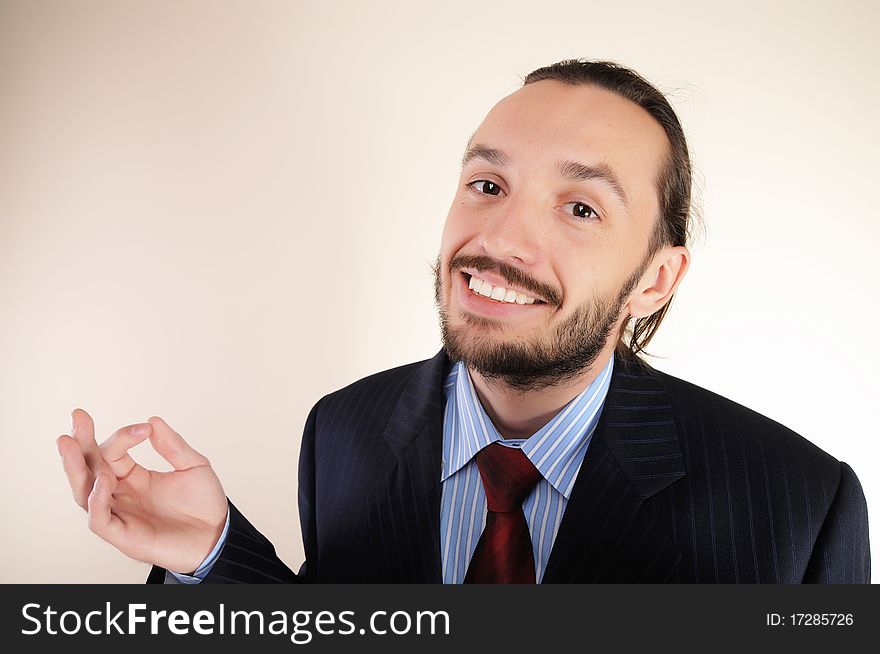 Portrait of a young successful business person in the office. Portrait of a young successful business person in the office