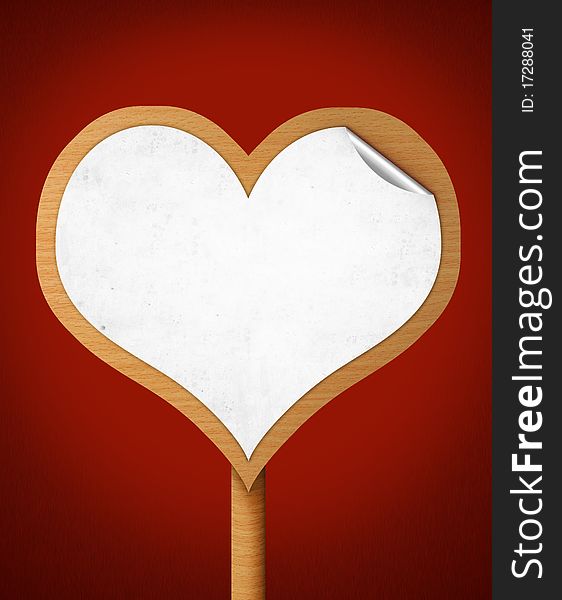 Blank sign in heart shape with white paper stick on it. Blank sign in heart shape with white paper stick on it