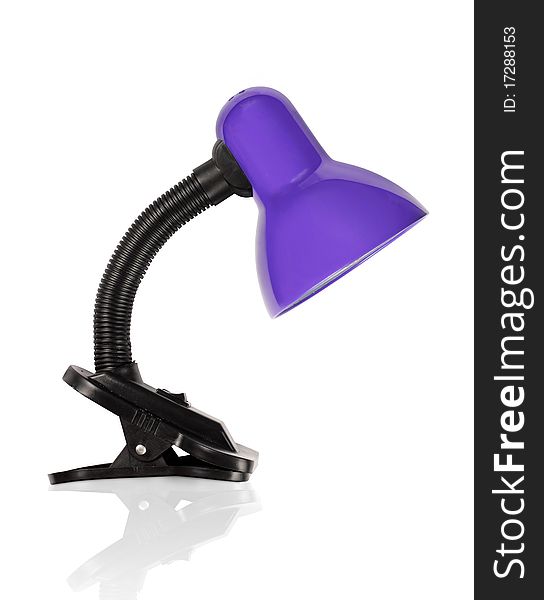 Flexible purple desklamp bent downwards. Flexible purple desklamp bent downwards