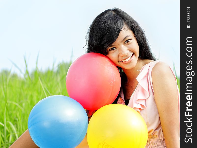 Smiling Teenage girl with colorful balloons. Smiling Teenage girl with colorful balloons