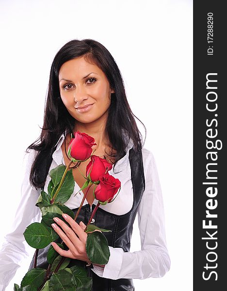 Portrait of young charming girl with a bouquet of roses Valentine's Day