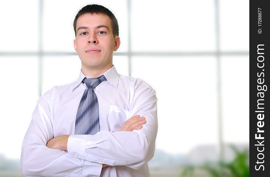 Young business man in the office workplace.