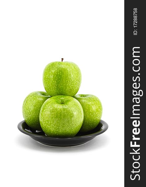 Green apple with plate